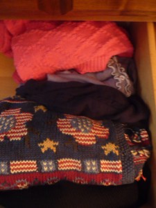 Keep like with like, as I keep my sweaters together in one drawer