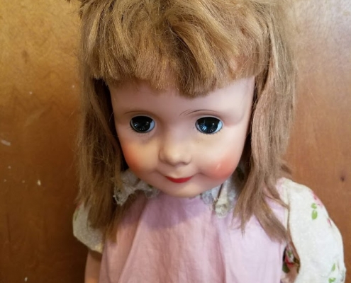 my doll after her haircut
