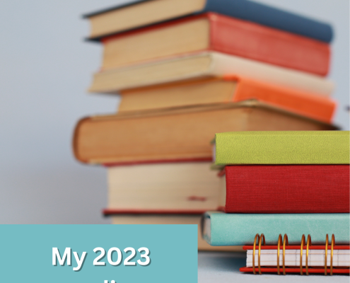 Stack of colorful books with text on the bottom left hand corner that says "My 2023 Reading"